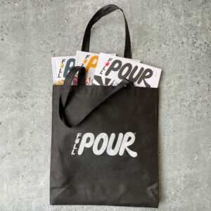 Full Pour everyday tote bag in black with white screen printed logo on front