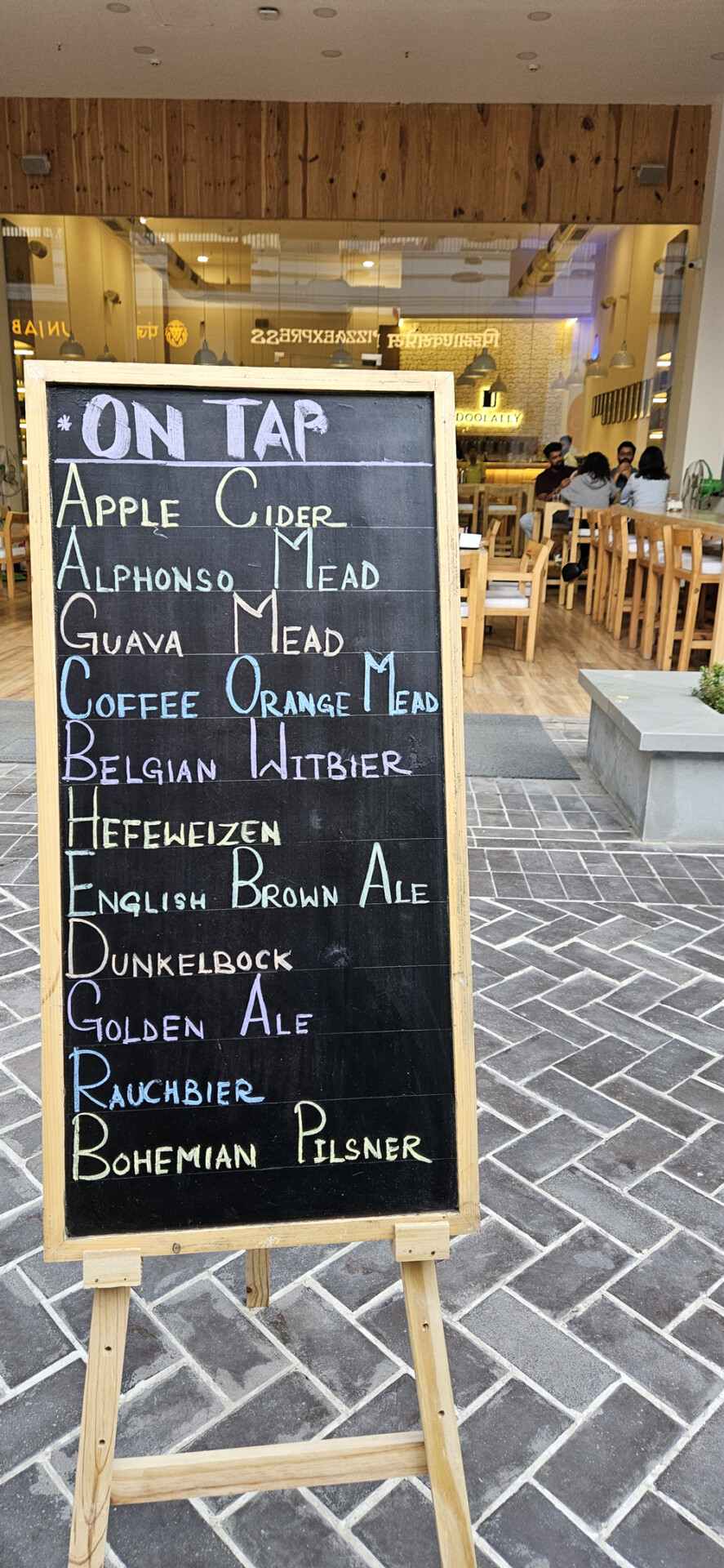 A tap menu chalkboard at Doolally Craft Beers