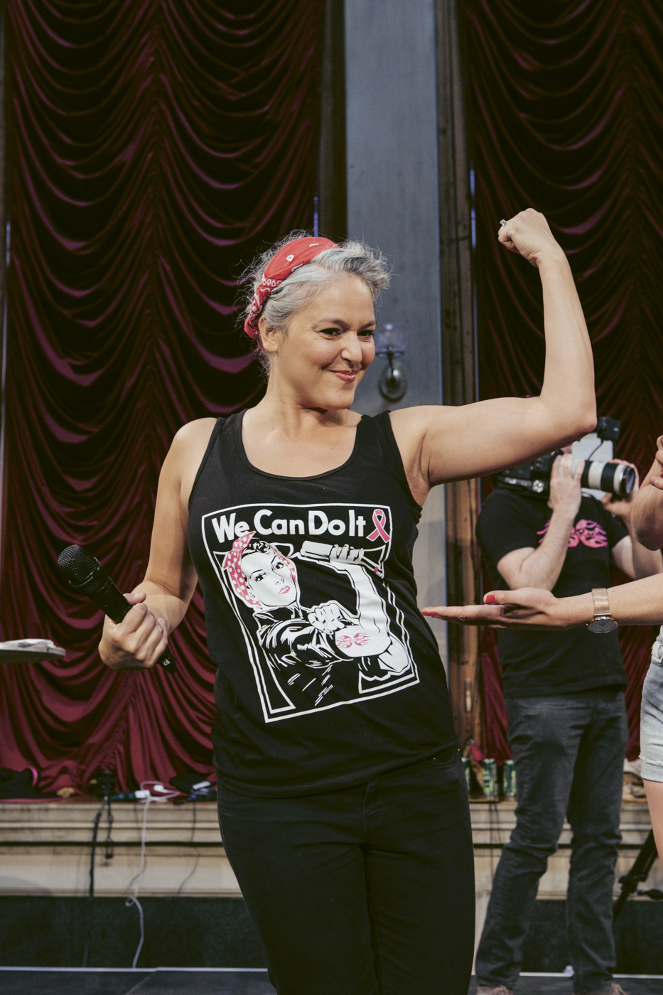 Lynnette Marrero flexes a muscle at the Speed Rack competition.