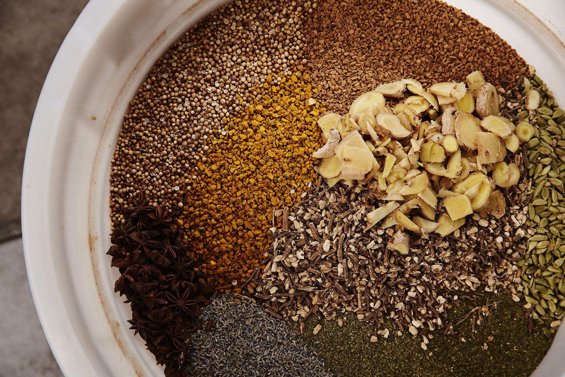 Raw distillation ingredients in a bucket ready for the still at Four Pillars Gin.