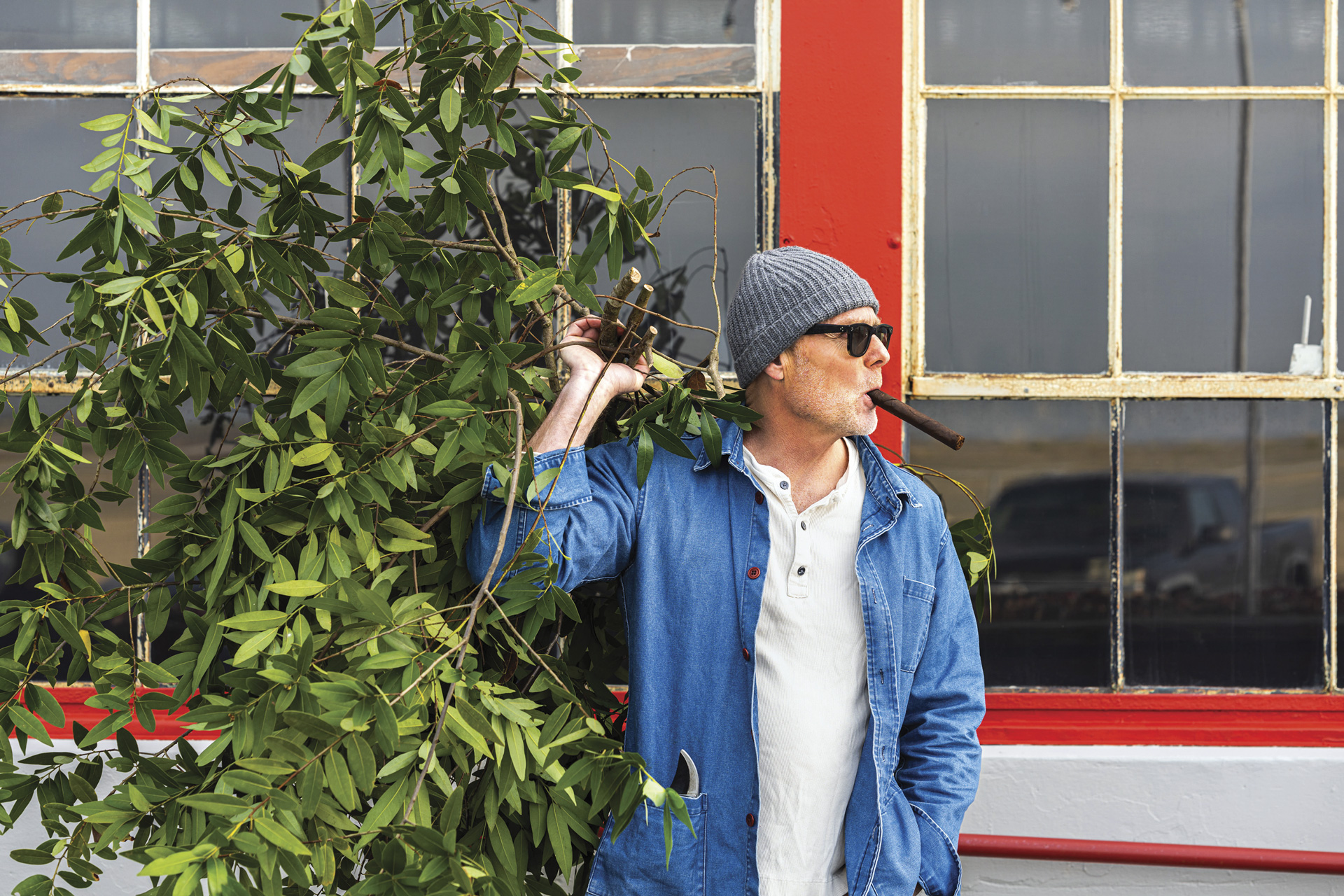 St. George Spirits Master Distiller Lance Winters with foraged California bay laurel branch in hand
